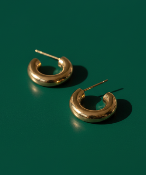 Arracadas Uma en Acero Inoxidable y Oro 18 K